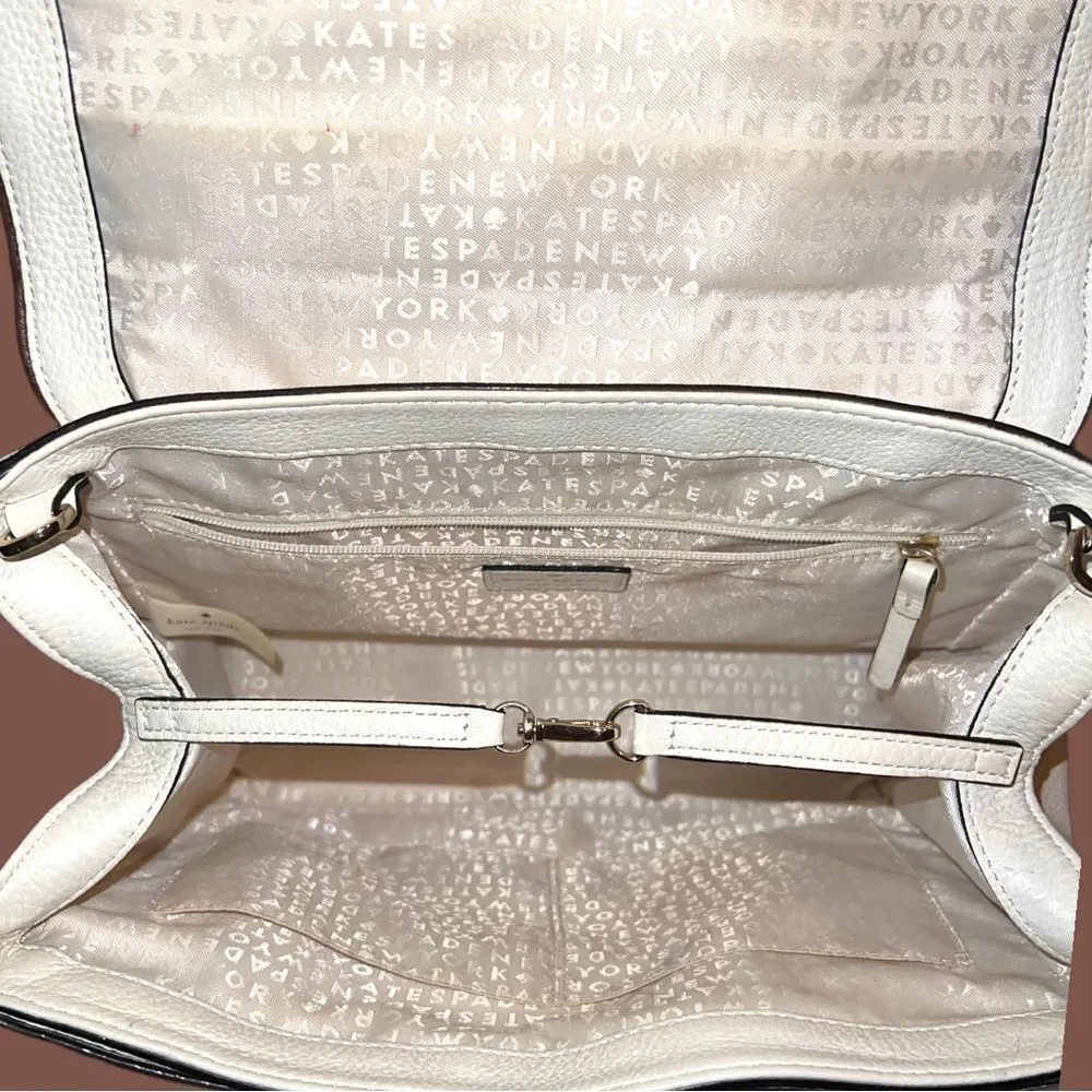 Kate Spade envelope purse. Cream with brown trim . Euc!